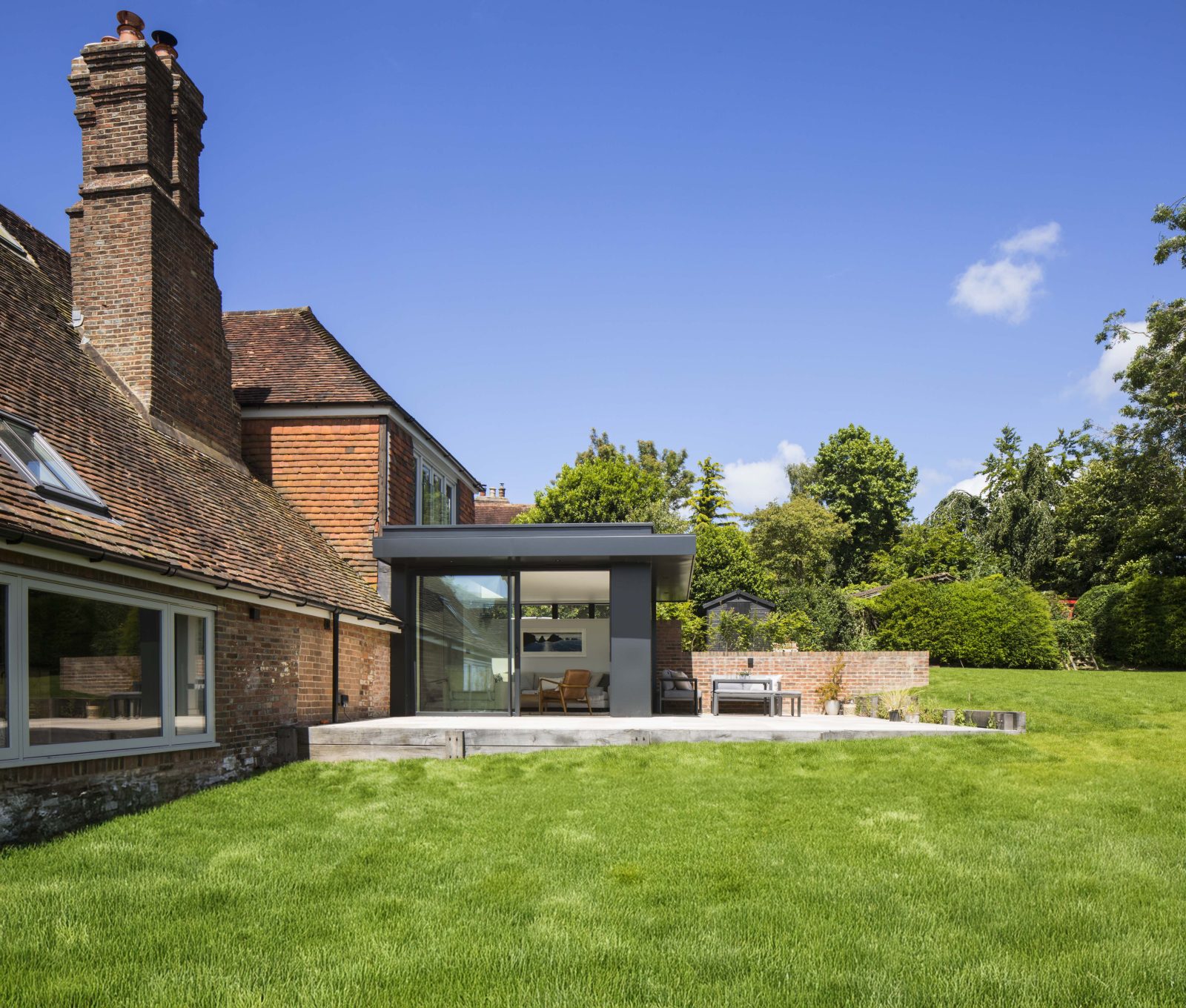 Image showing upgrades to a historic home, including glazed extension. LEAF low energy consultancy, Sussex